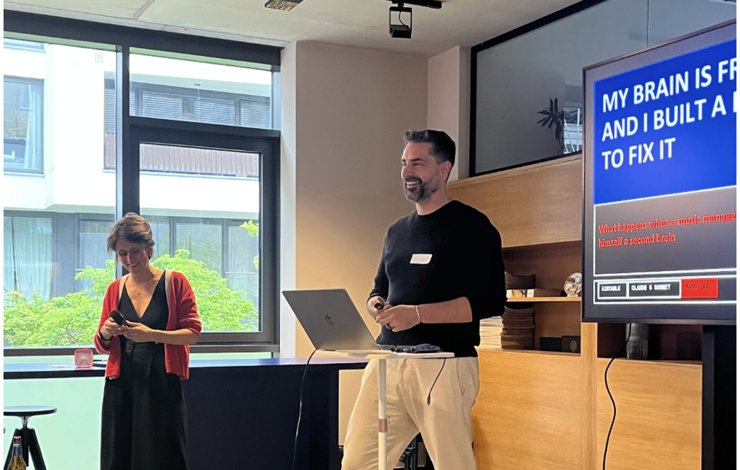 Margaux Pelen and Rainer presenting an AI use case at One Last Prompt in Berlin